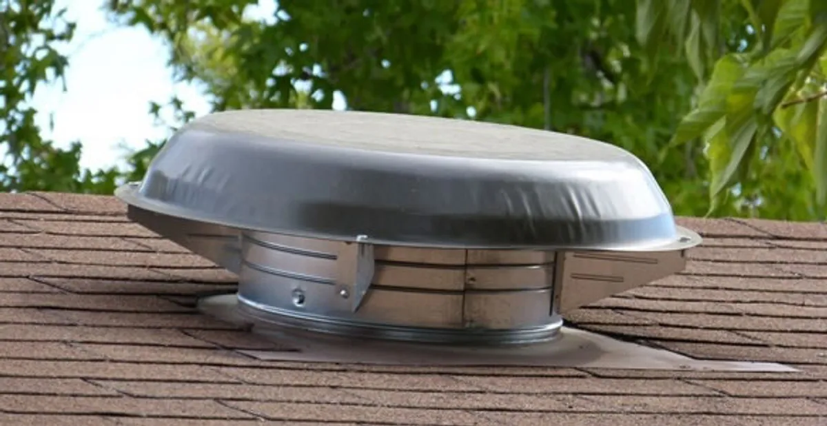 attic fan installation services with low-profile roof ventilation unit in Albany, NY