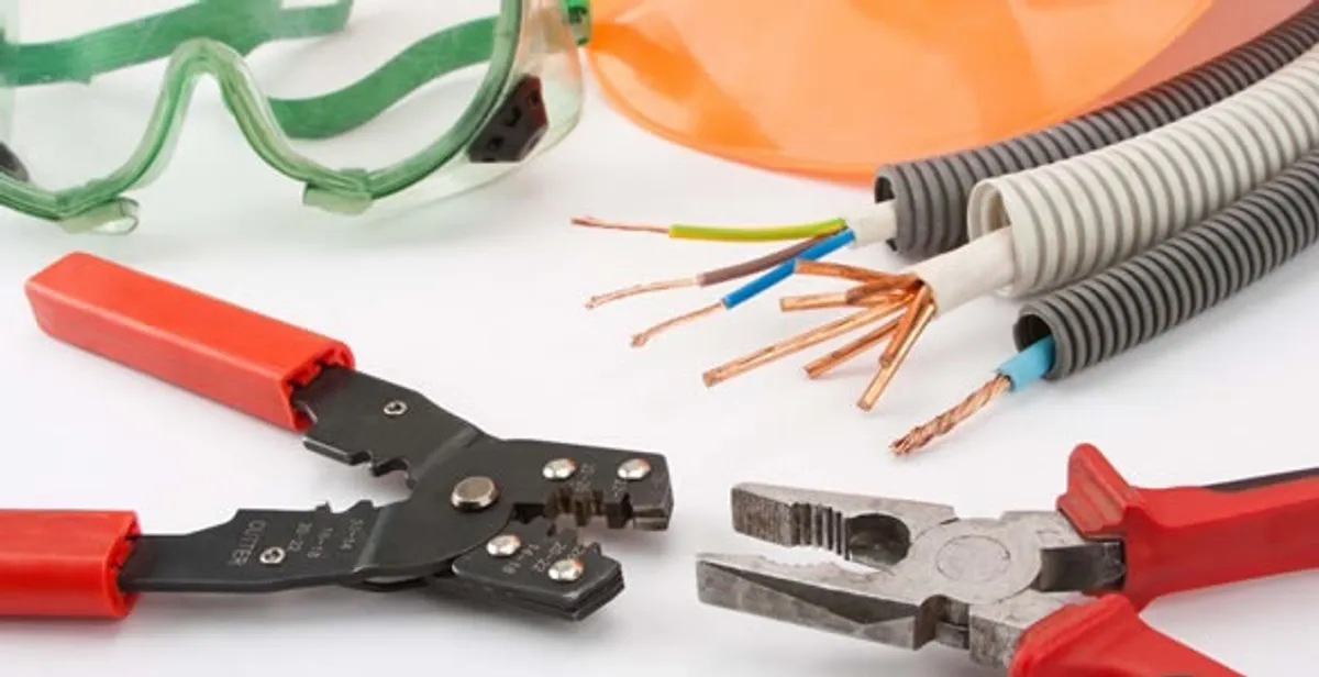 Electrical wiring repair with professional tools and safety equipment in Slingerlands, NY