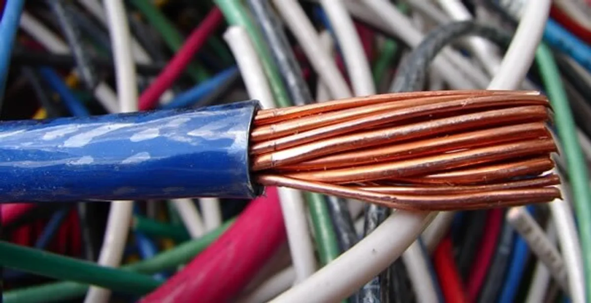 electrical wiring services showing exposed copper conductors and cable preparation in Albany, NY